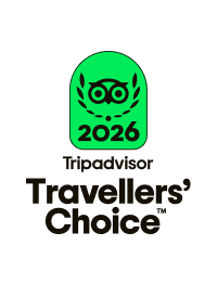 Badge Tripadvisor Travellers' Choice 2026 vert avec logo de chouette et texte noir.